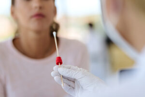 closeup healthcare worker taking pcr test medical clinic Central de Consultas | Clínica Popular