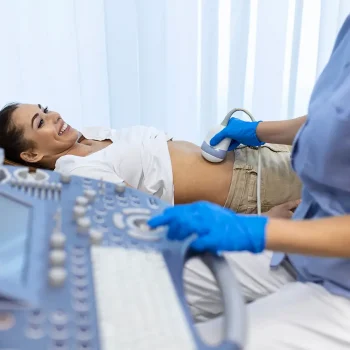ultrasound-diagnostic-stomach-abdominal-woman-clinic-closeup-view-doctor-runs-ultrasound-sensor-patient-s-girl-tummy-looks-image-screen-diagnosis-internal-organs